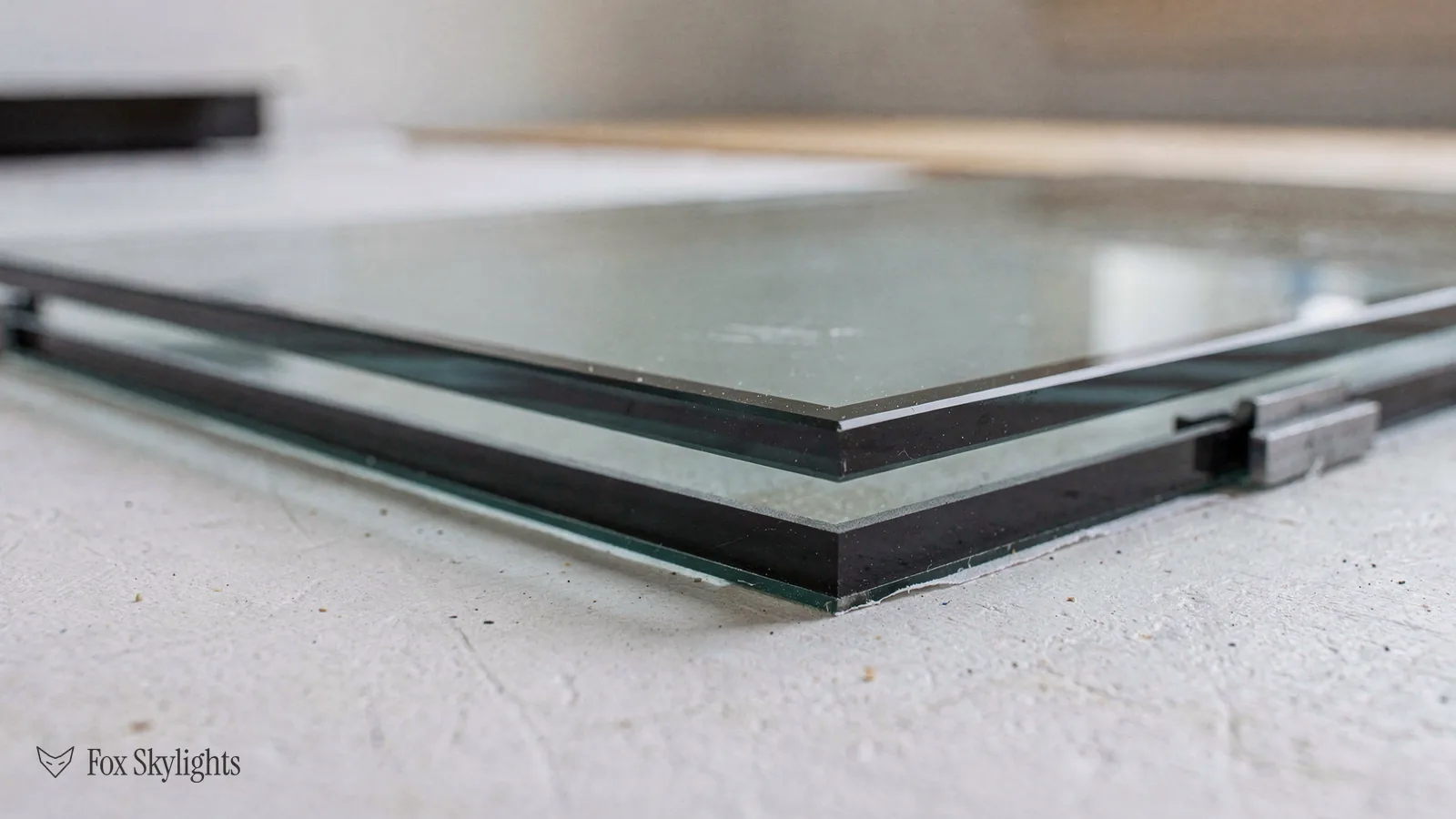 Close view of the layered edge of a sealed glazed unit